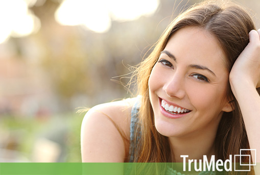 woman-smiling-with-perfect-smile-great-mood-after-seeing-Naturopath-in-Edmonton